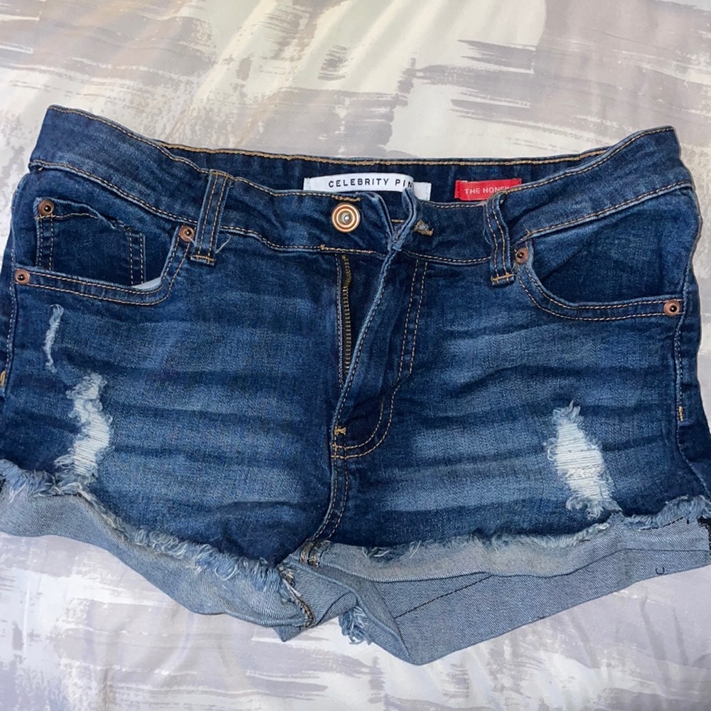 Used in great condition, ripped jean short shorts.
